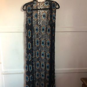 Forever21: Bohemian long knitted vest.